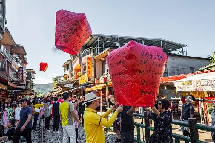 Releasing sky lanterns on Shifen Old Street