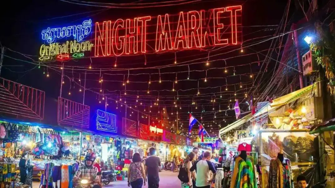 The neon entrance of the night market in Siem Reap