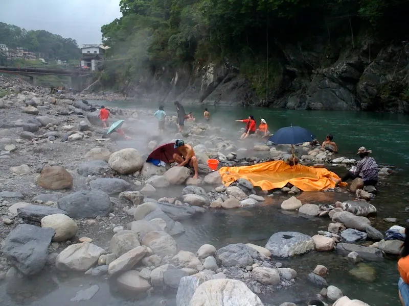 Bathers in the riverside hot springs along the Nanshi River, Wulai