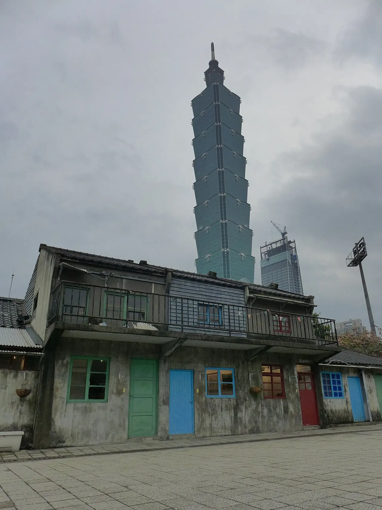 Four Four South Village (Xinyi Assembly Hall) with Taipei 101 behind