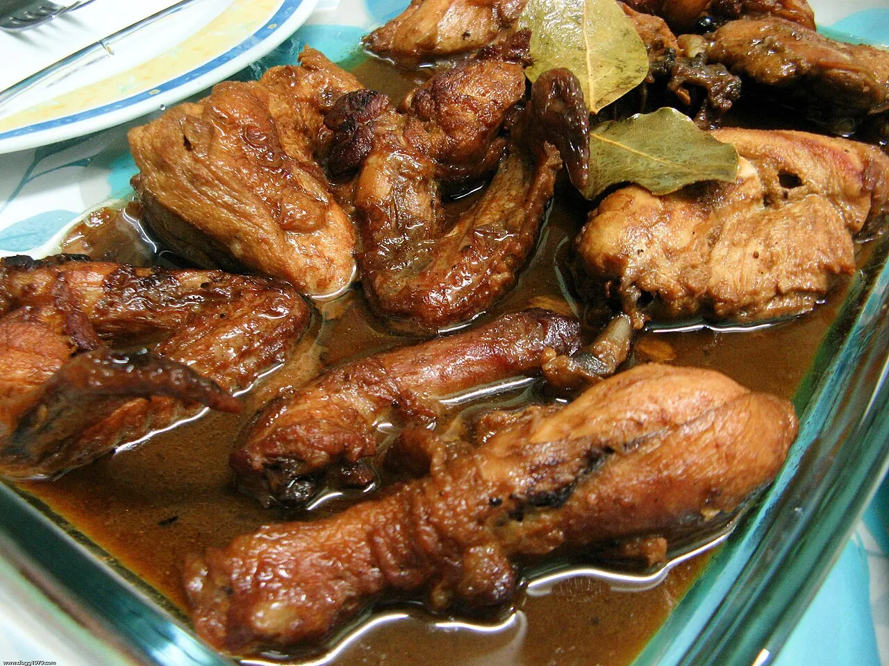 Filipino chicken adobo braised in soy sauce, vinegar and garlic
