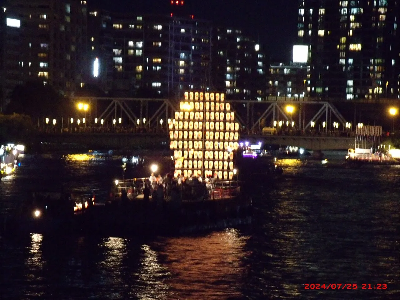 A lantern boat on the river during the Tenjin Matsuri in Osaka