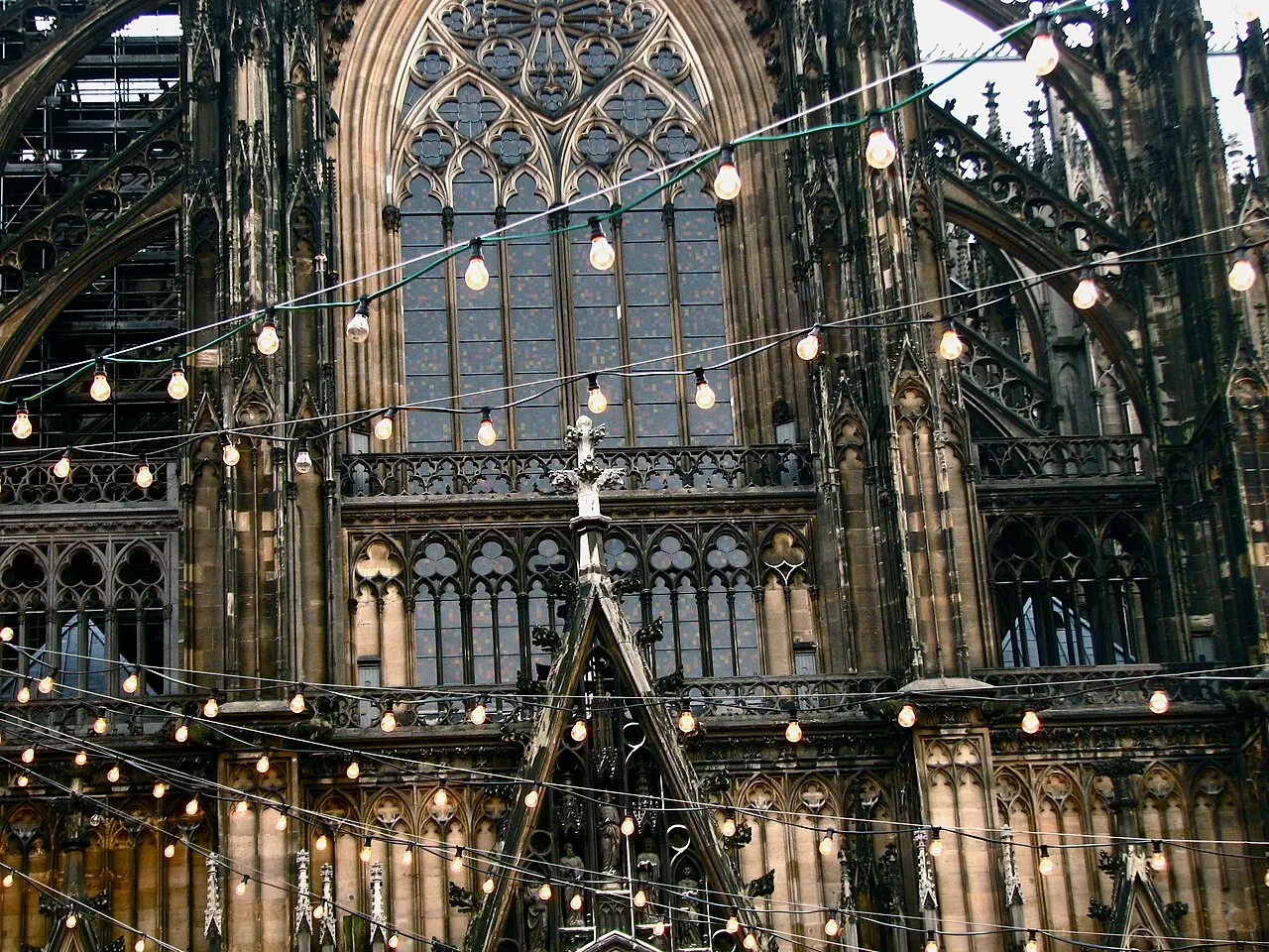 Strings of lights from the Christmas market in front of Cologne Cathedral