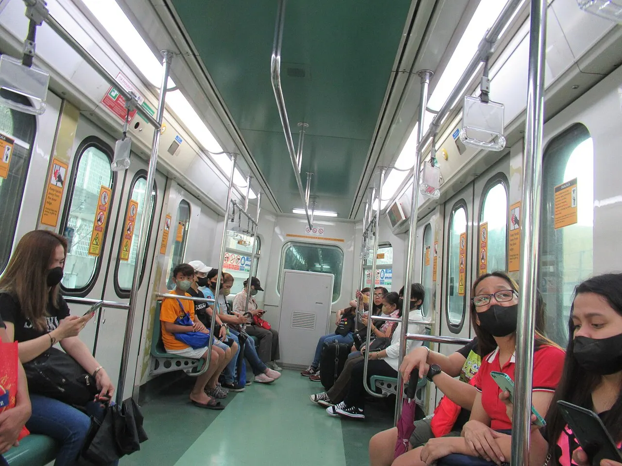 Passengers inside an LRT Line 1 train, Manila